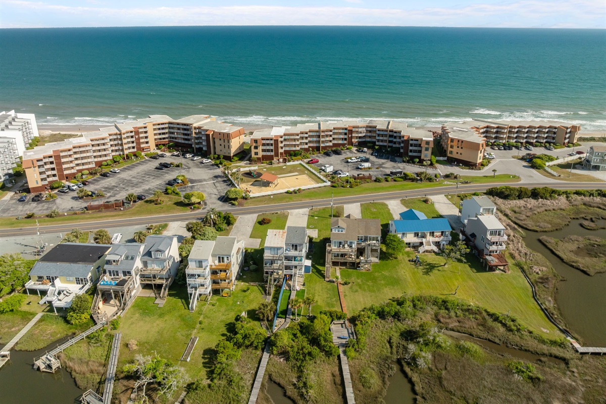 Coastal living at its best: oceanfront condos with marsh views just across the street