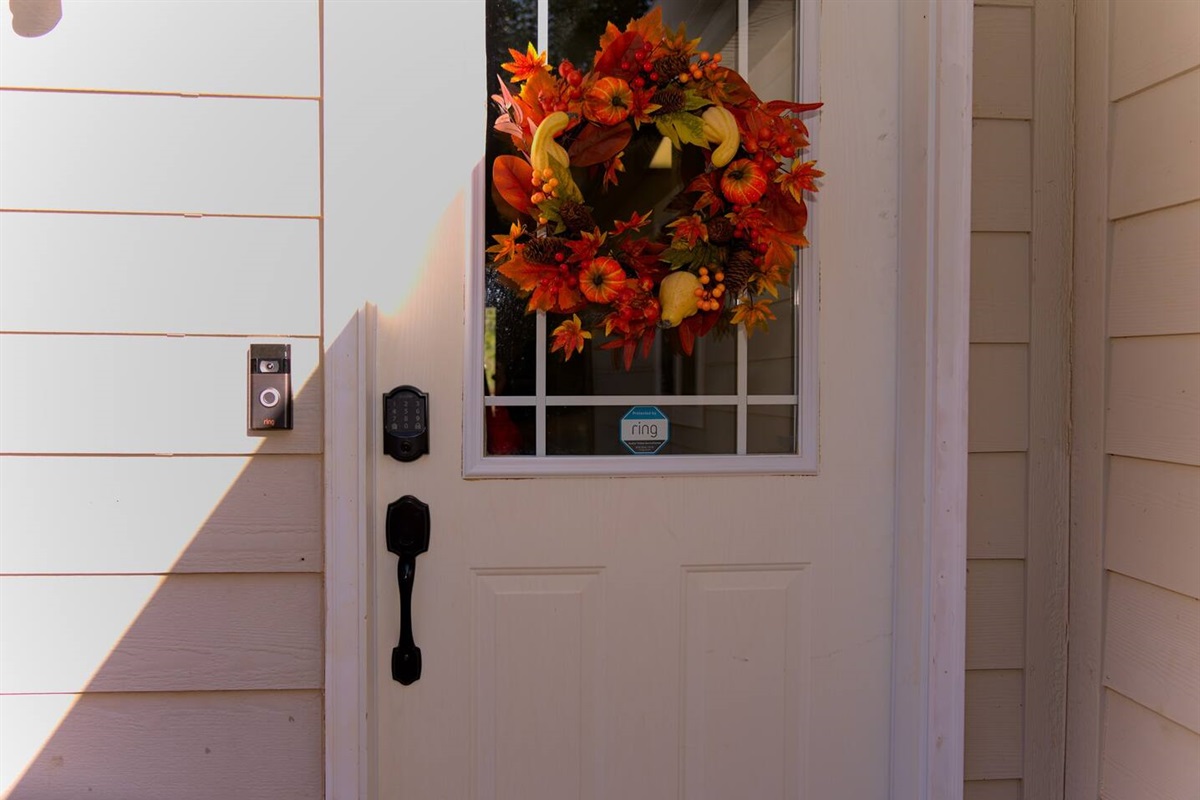 The house is equipped with a smart lock, offering keyless entry.