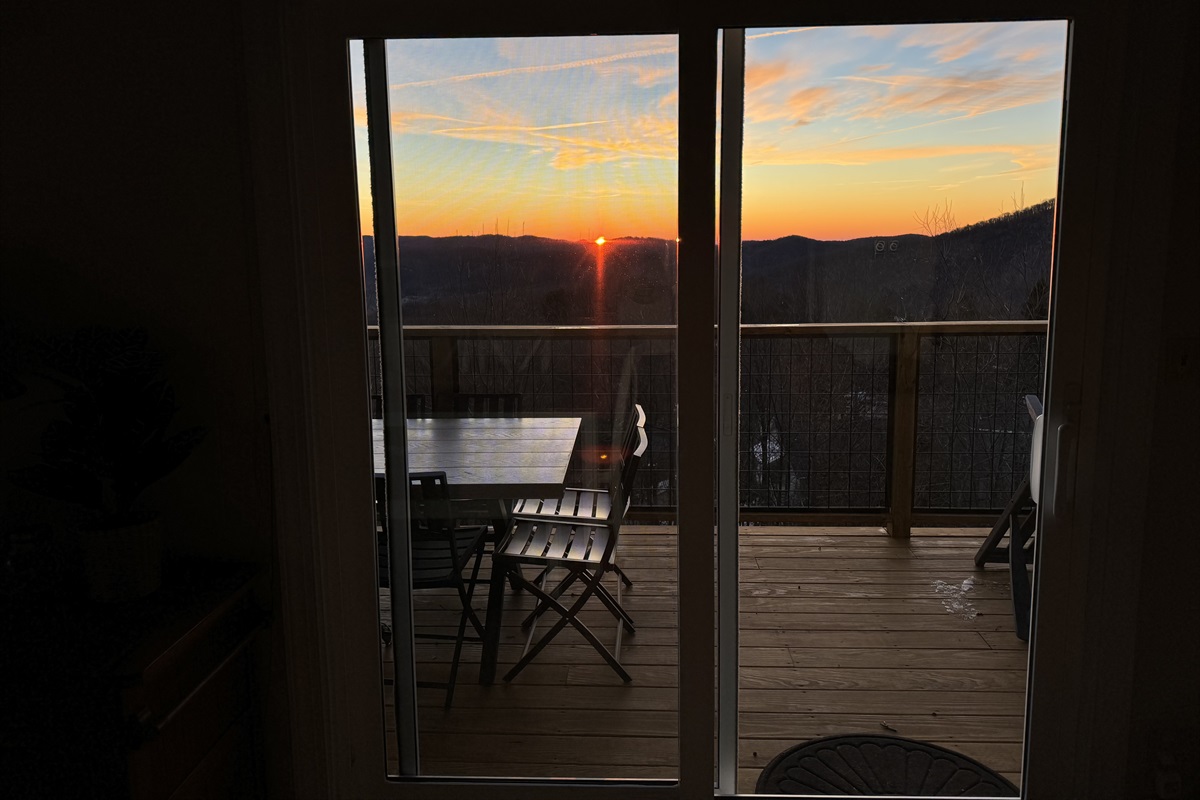 Dining with amazing views! Our dining table seats 6 (with 4 chairs + 1 bench that seats 2 more) & 4 barstools that are adjacent to this table, under the kitchen counter bar to seat 10 total.