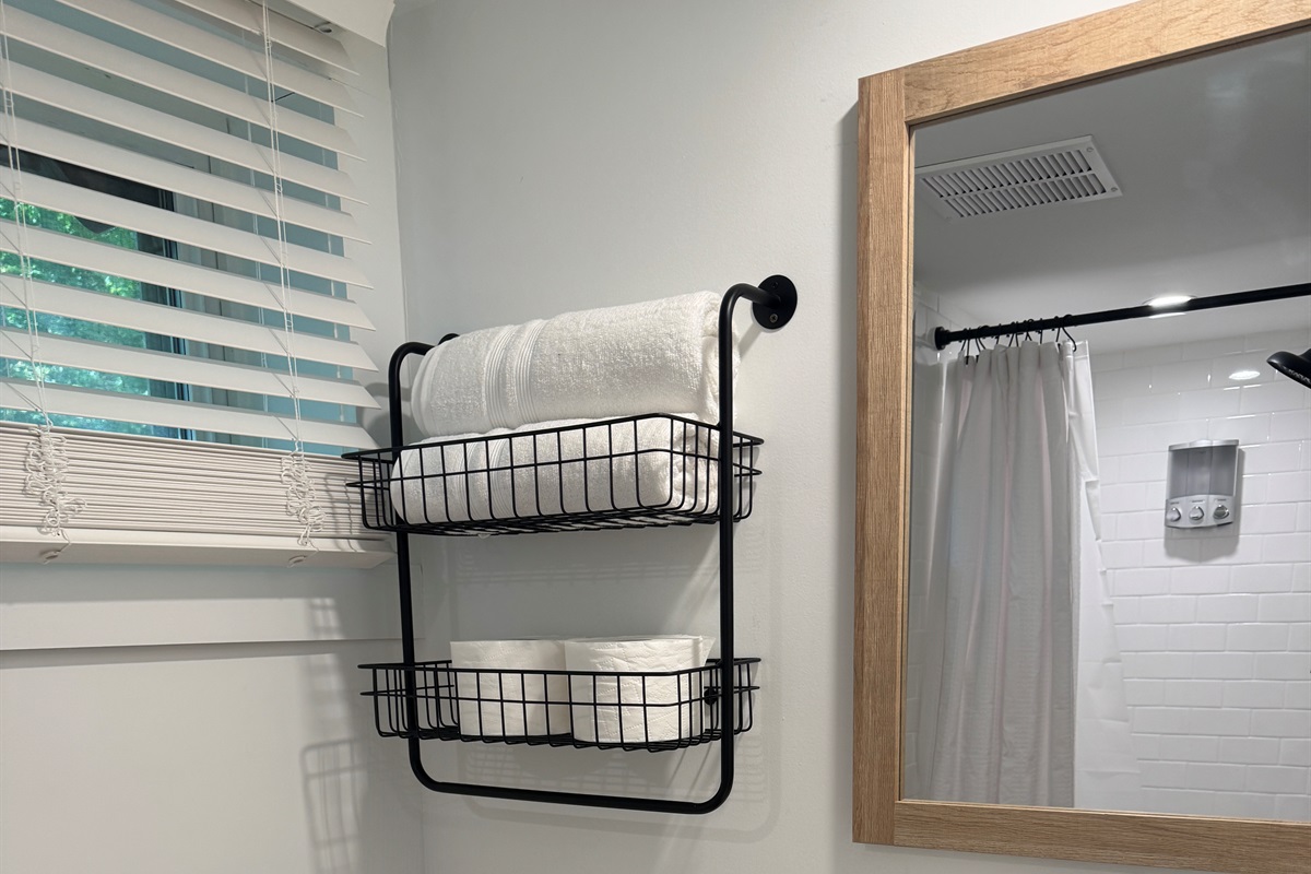 En-suite bath with  shower