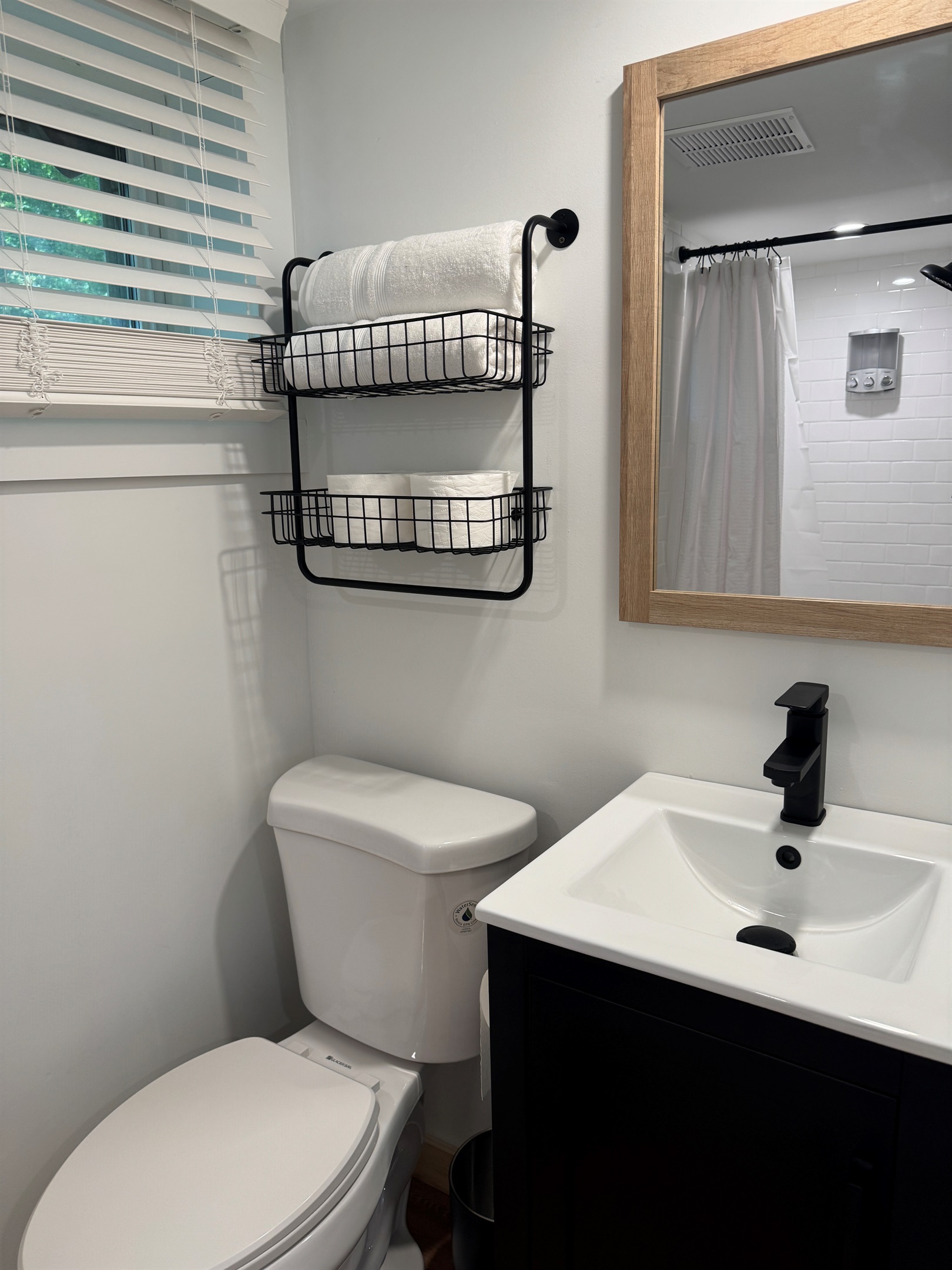 En-suite bath with  shower