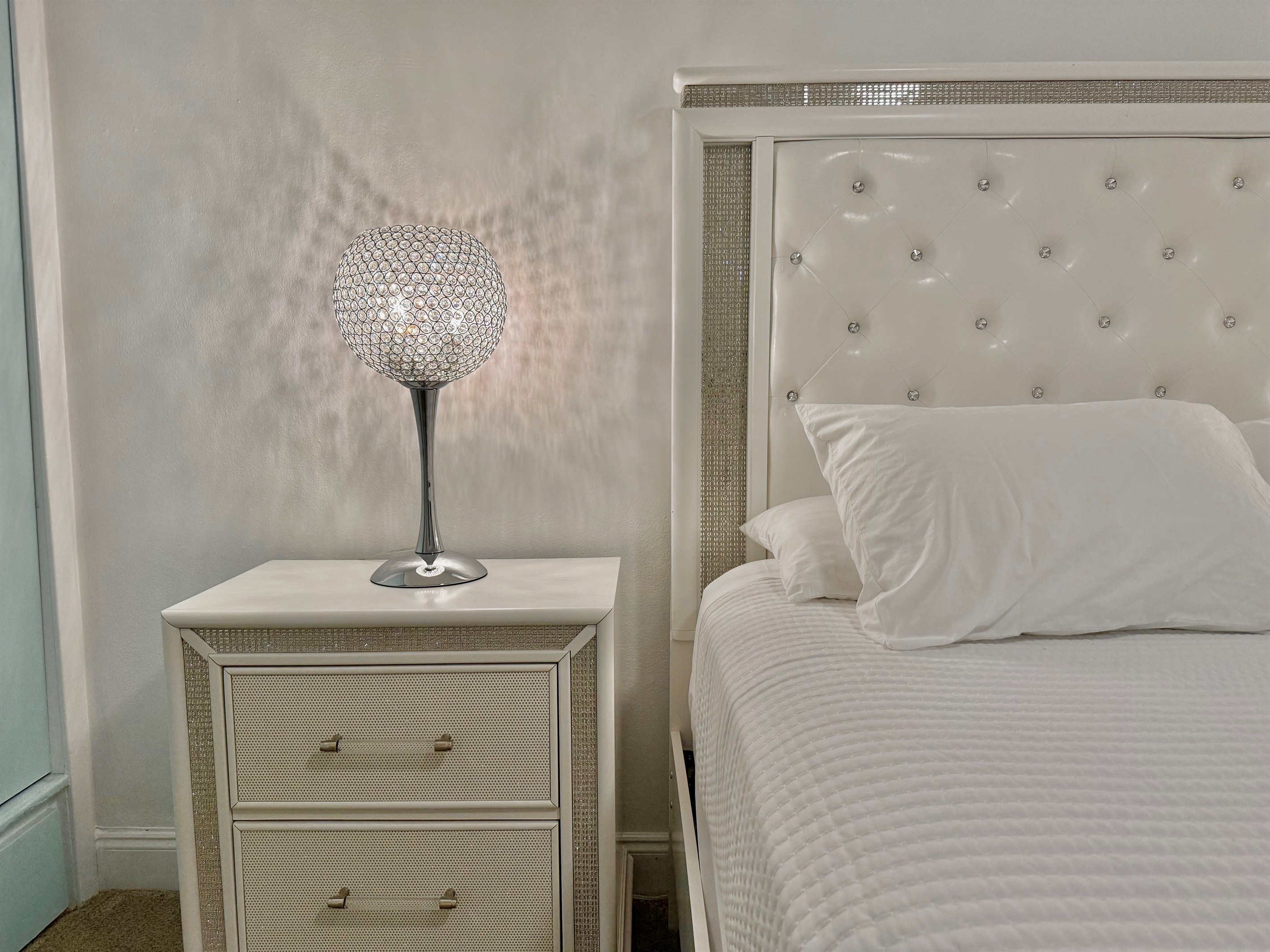 With luxe touches and a calming color palette, this bedroom feels like your own private boutique getaway.