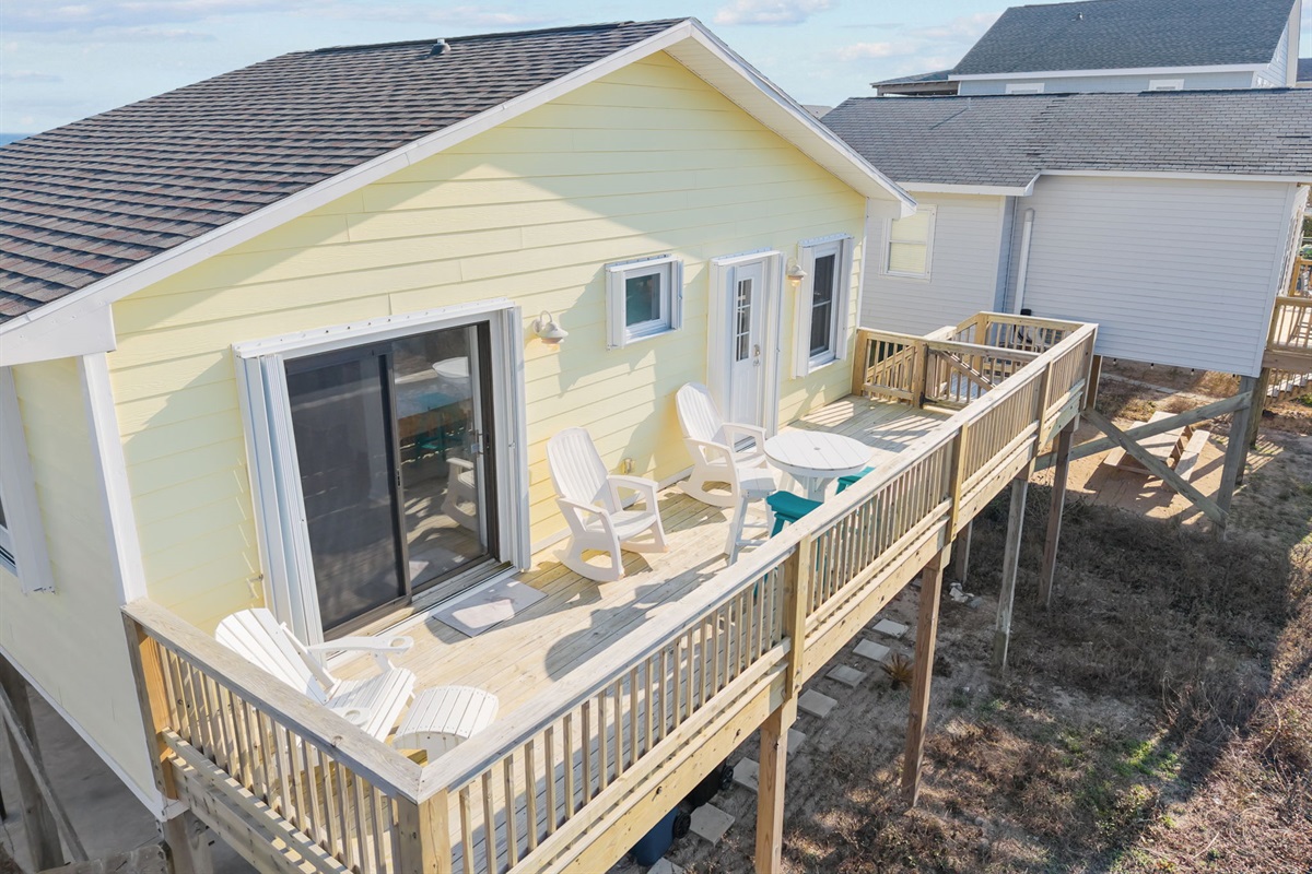 Corner view featuring Adirondack chairs and easy access from the living space