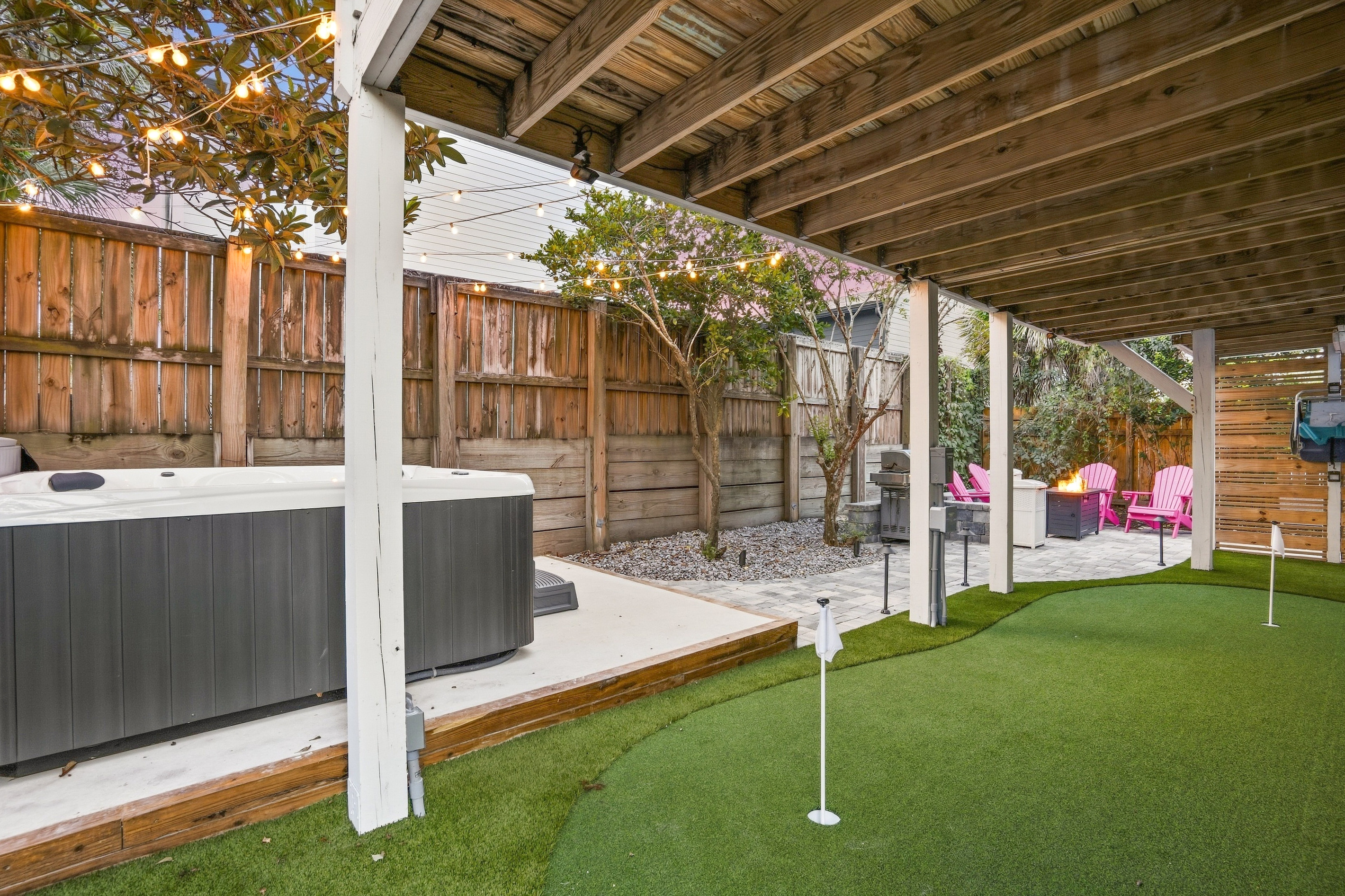 There is something for everyone! Hot tub, fire pit, and a putting green