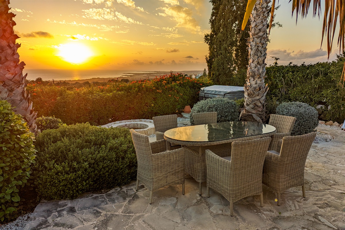 Gather around the second outdoor dining table nestled in the heart of the garden - ideal for breakfast, lunch, or enjoying the sunset.