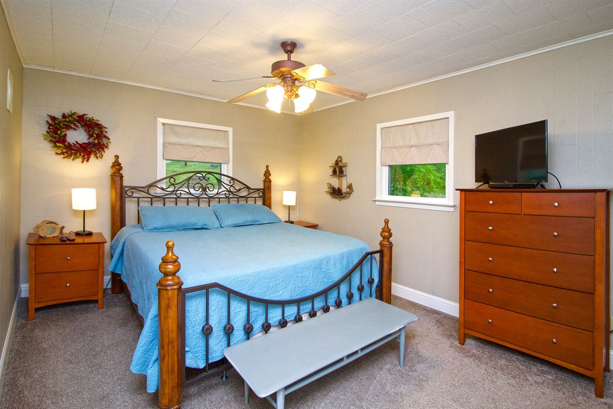Master Bedroom (Bedroom 1) King bed with Streaming TV & DVD.  Bathroom attached.