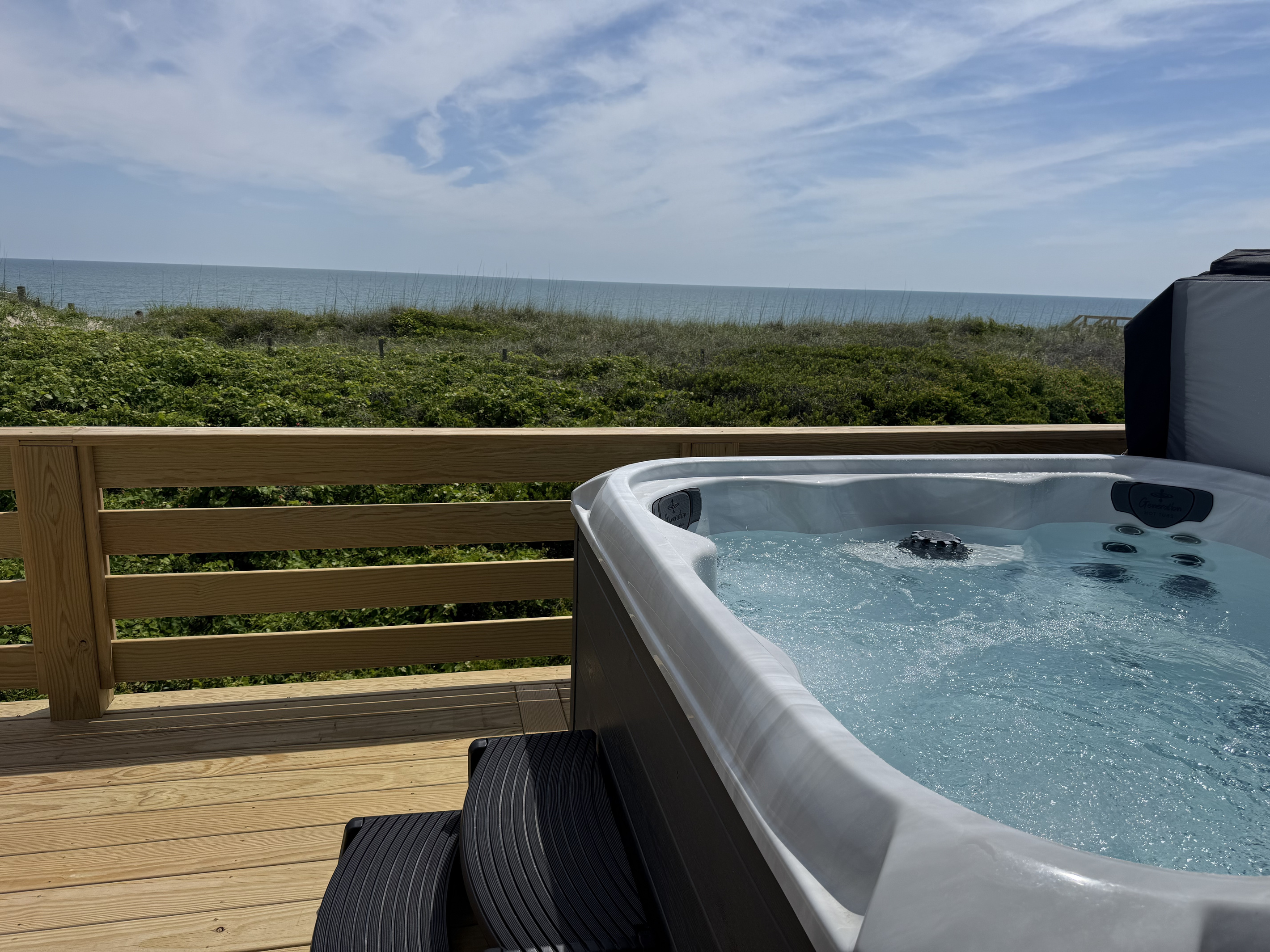 New hot tub with views overlooking the ocean