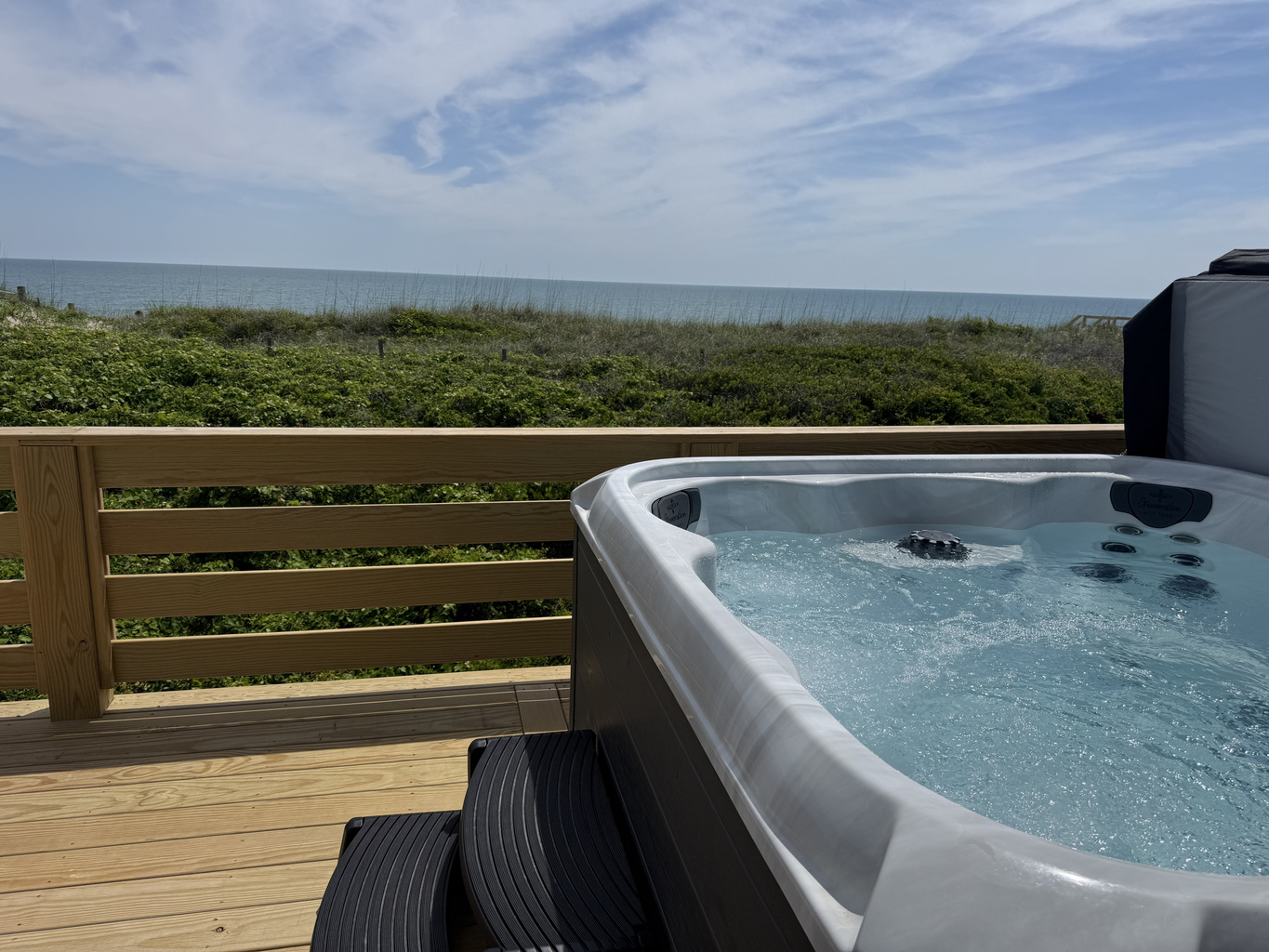 New hot tub with views overlooking the ocean