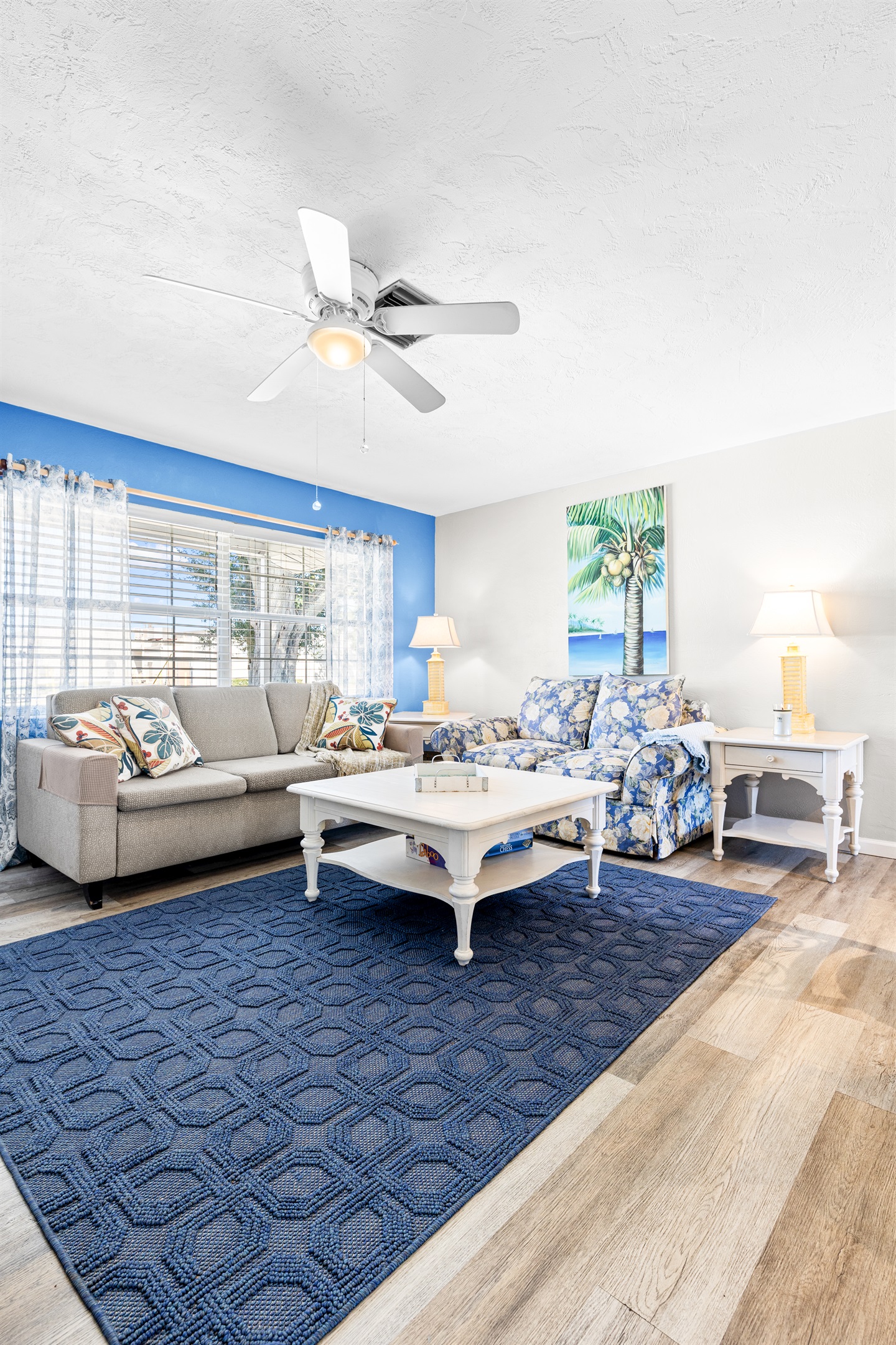 Living room with Roku TV, Games, DVD player w/DVDs, Books and a Guest table with Local Info!   Queen size MEMORY FOAM sofa bed!