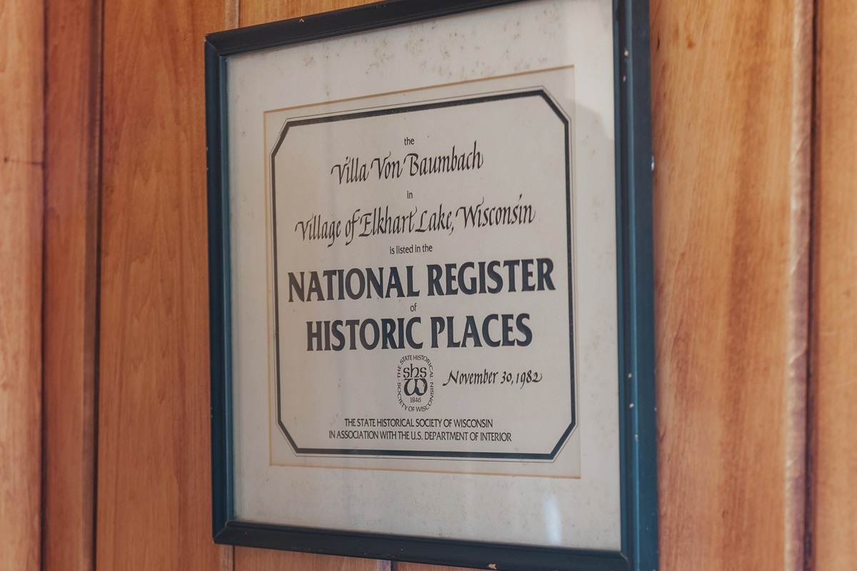 Framed plaque highlighting the home’s historic significance