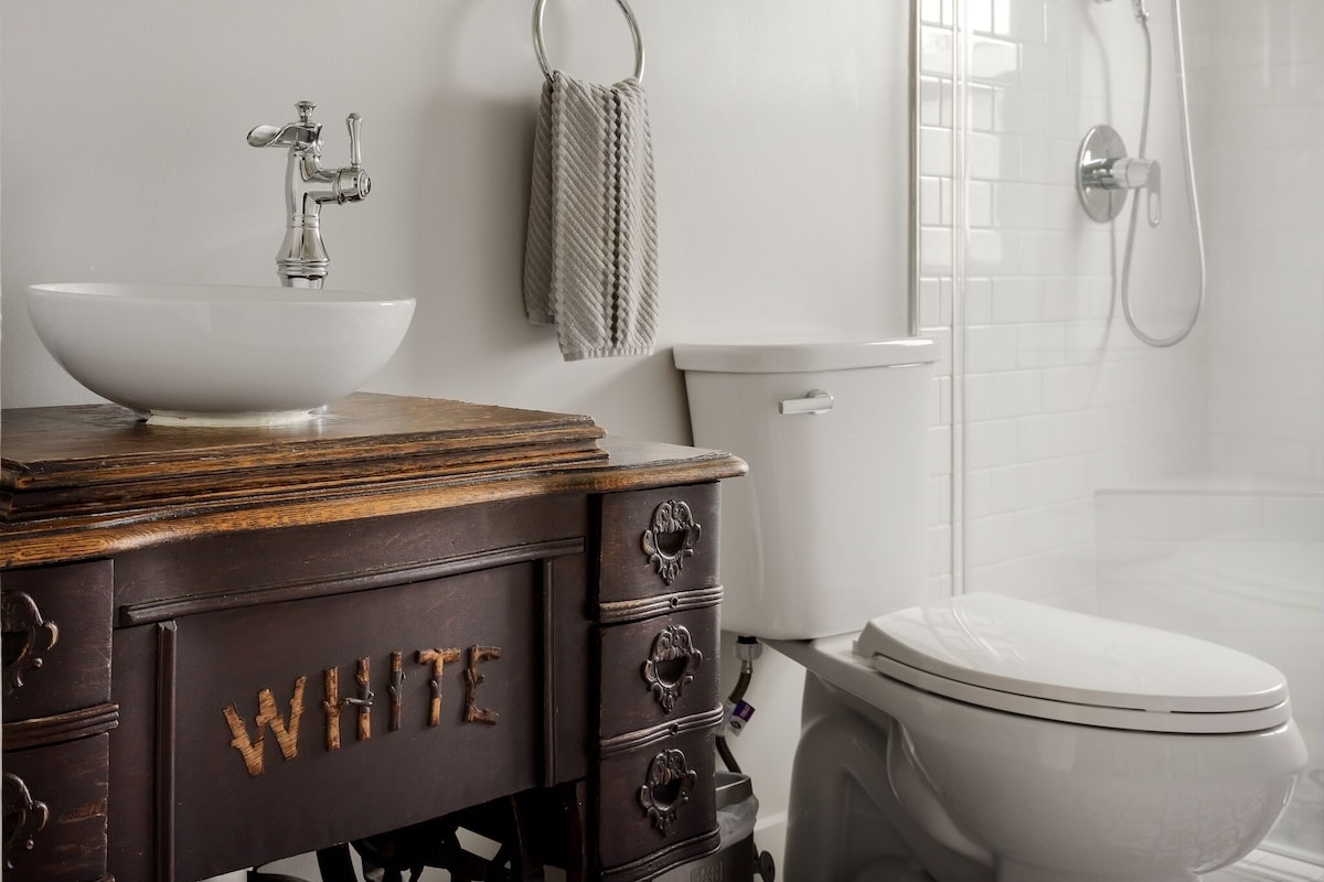 Bathroom 1, antique sewing machine repurposed as vanity