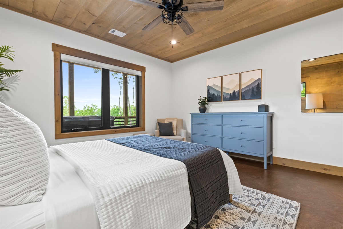 The gentle blues and cozy vibe of this room make it feel like floating in the forest.