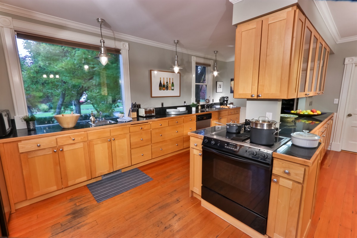 Incredibly well-equipped kitchen, thoughtfully set up for cooking meals meant to be shared.