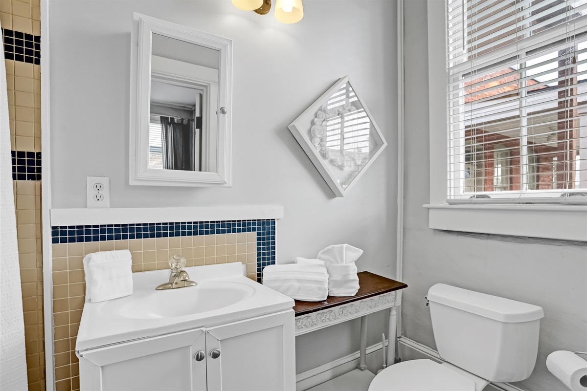 Unique tile design adds a stylish touch to this sleek, contemporary bathroom.