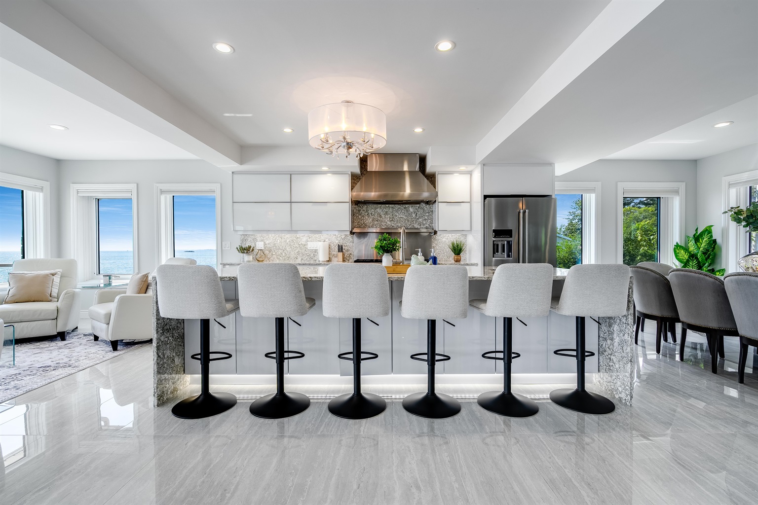 Where the marble island gleams like ocean spray.