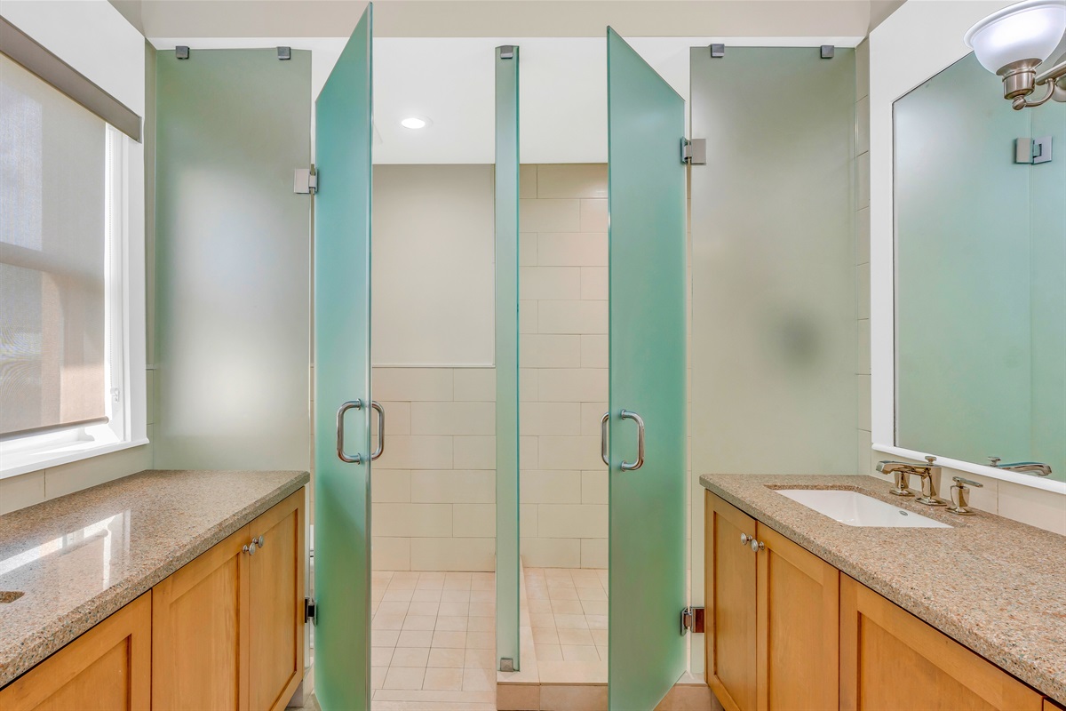 The ensuite primary bathroom design spares no expense.