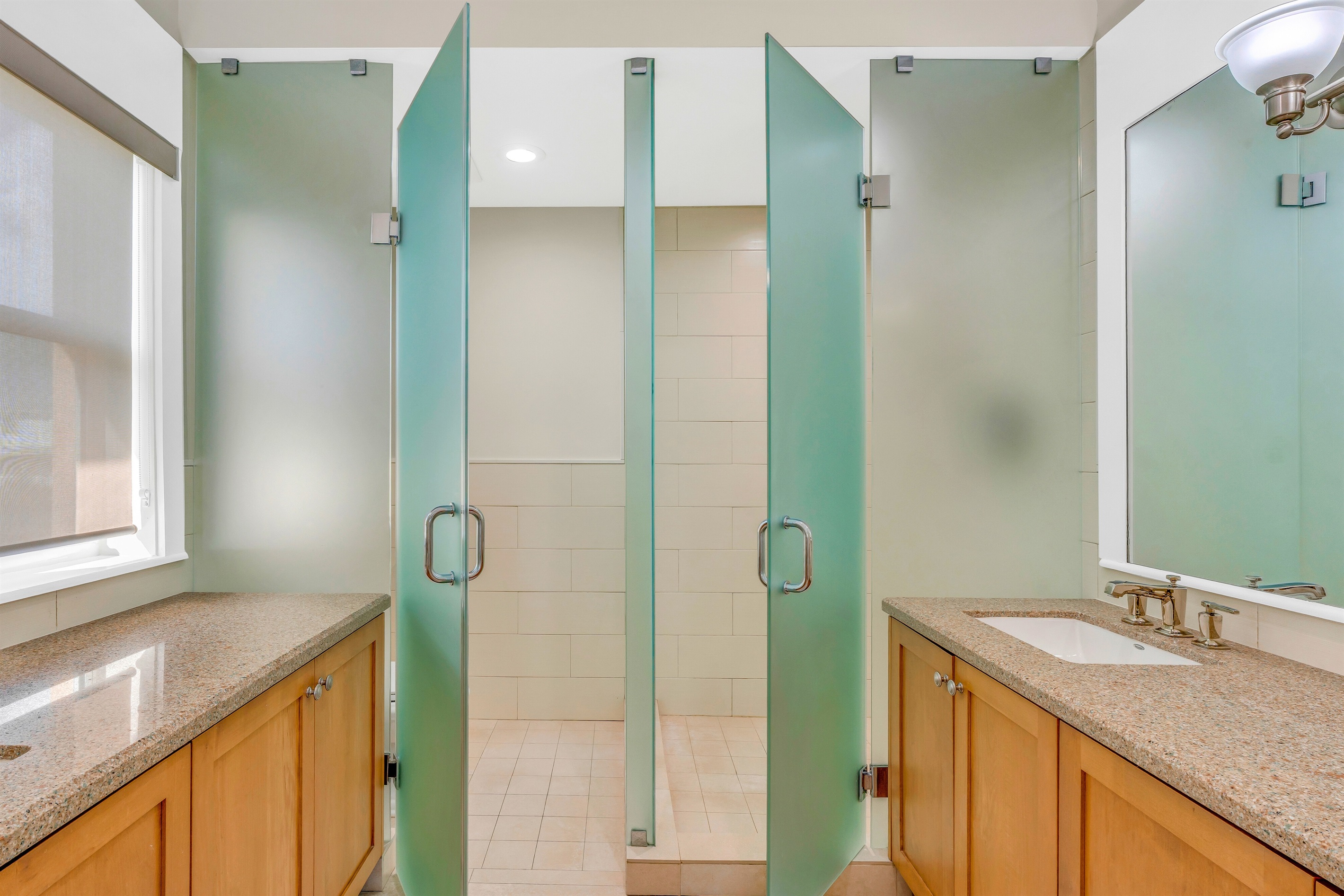 The ensuite primary bathroom design spares no expense.