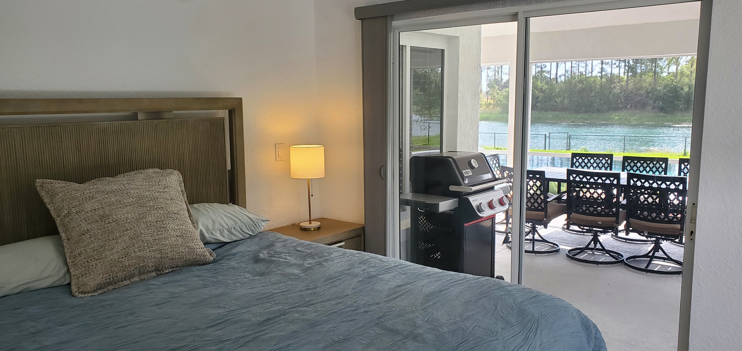 King bedroom with lanai access and private bath