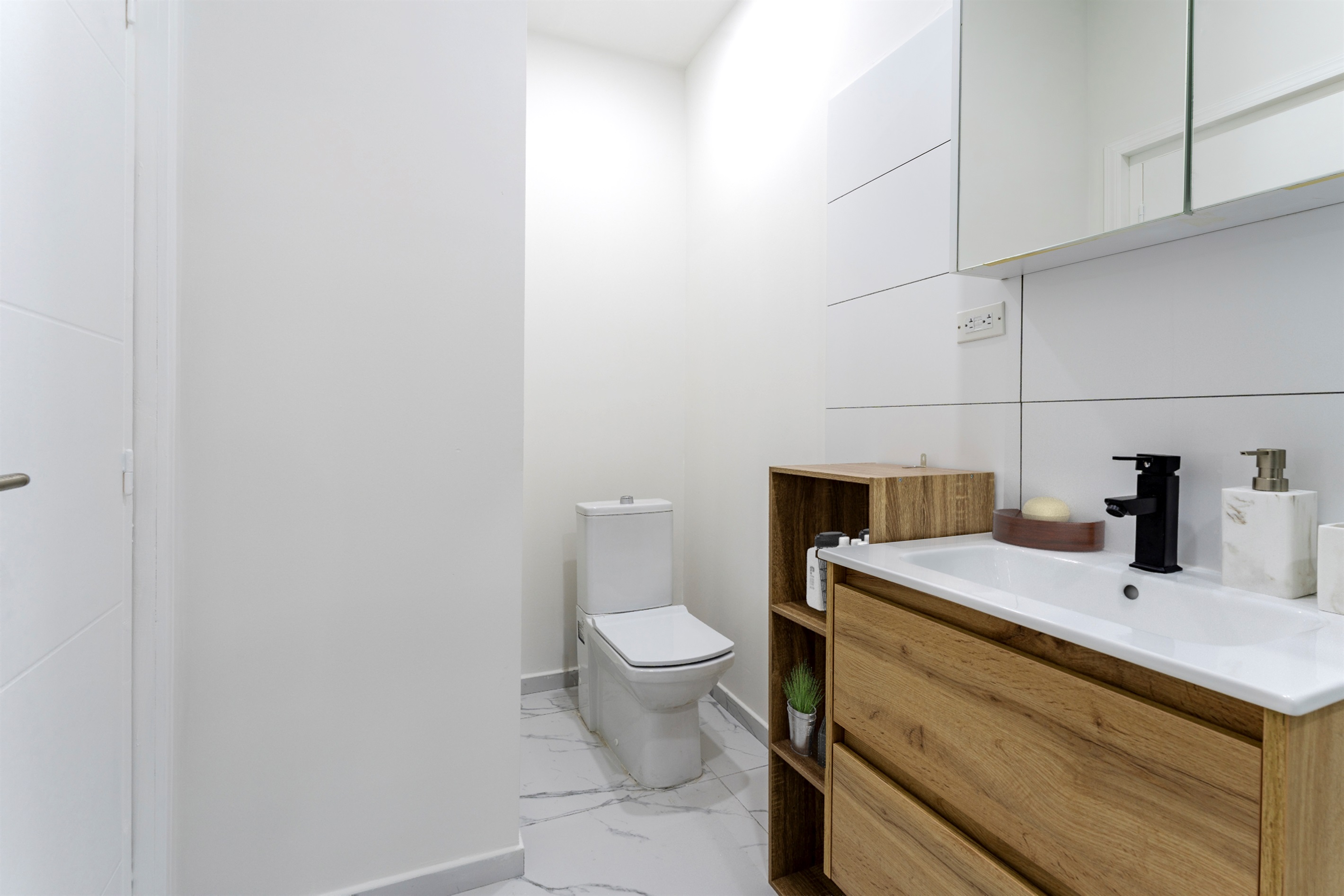 Detail of the modern fixtures in the second bathroom