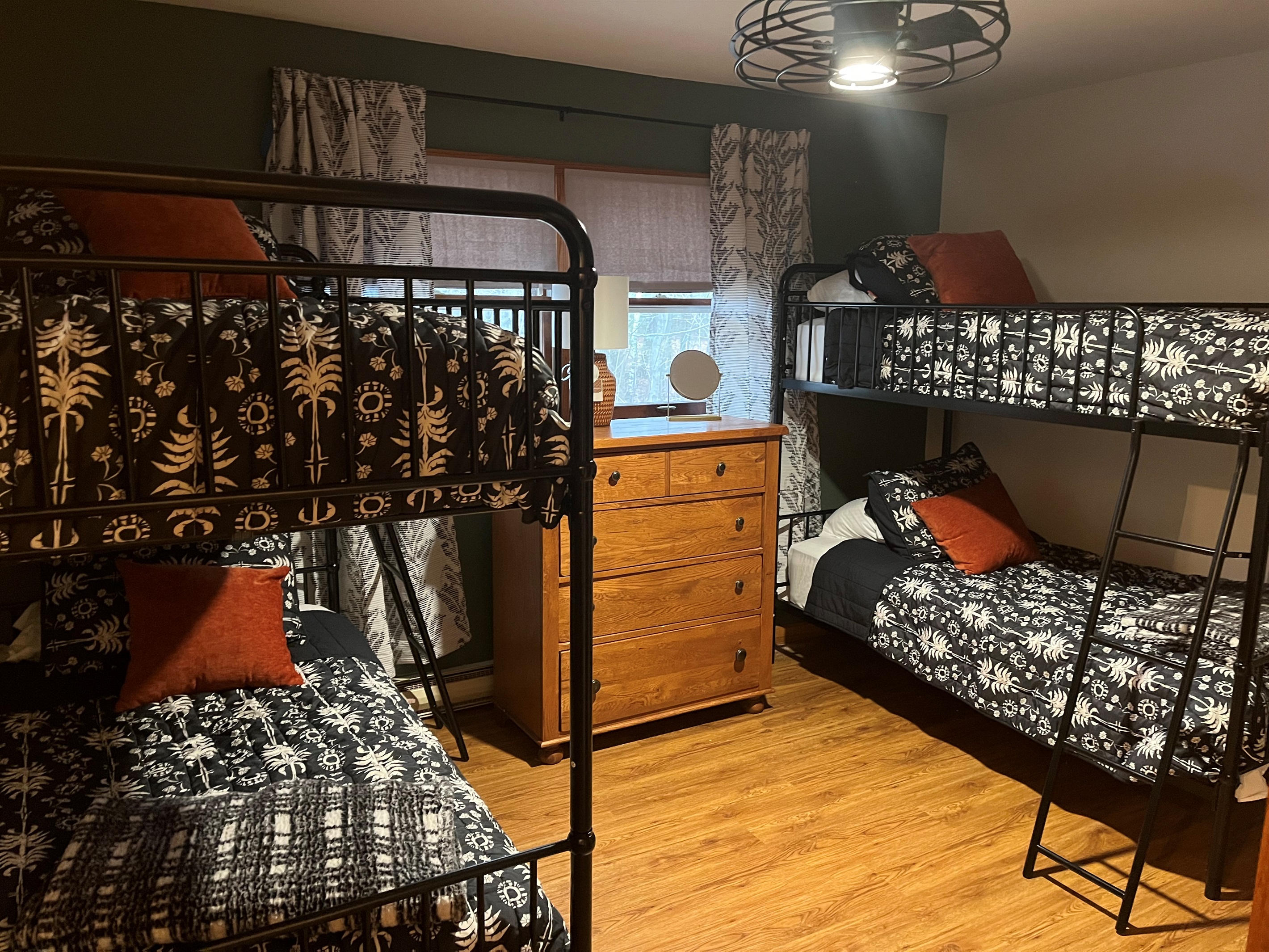 Bed 3: Two bunk beds, dimmable ceiling fan, blackout shades, tall dresser, closet, luggage rack, usb charger, door to 1/2 bath