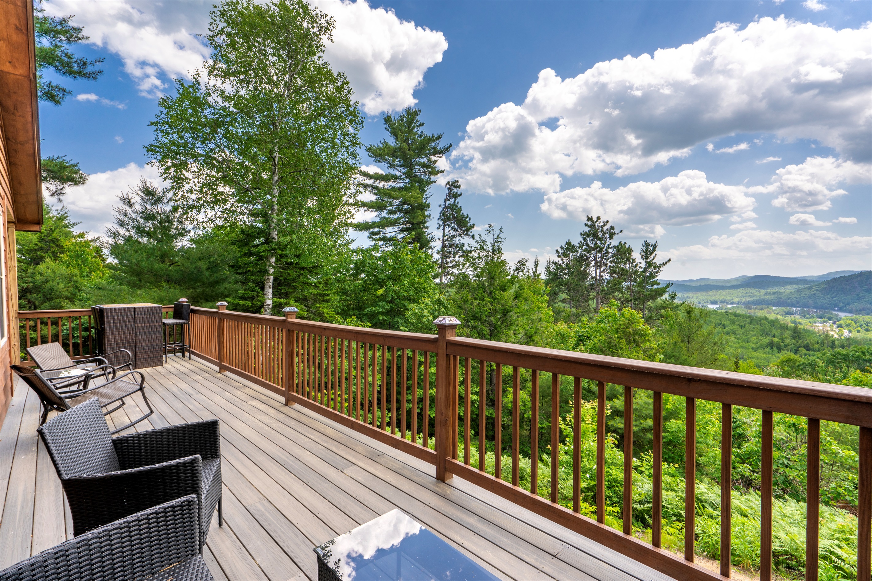 Relax and enjoy the views from the wrap around deck