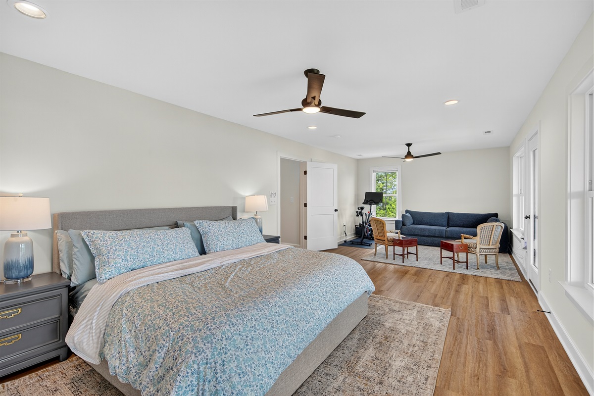 A cozy corner for rest and recharge, complete with a sleeper sofa and peaceful lake views.