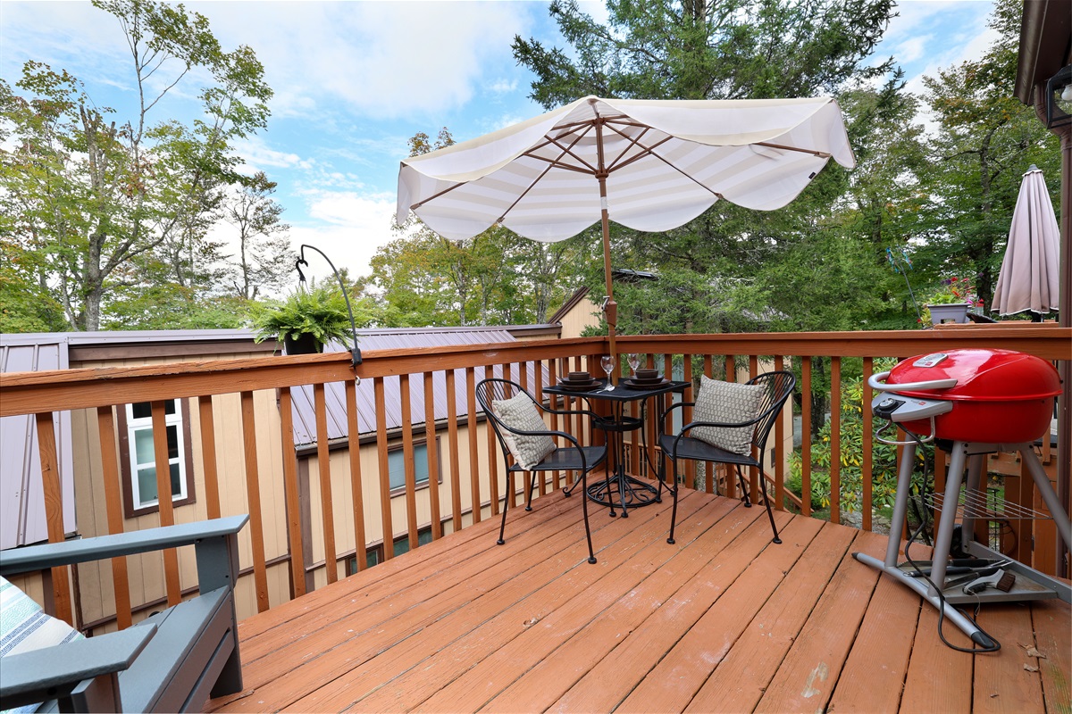 Patio Seating Area + Charcoal Grill