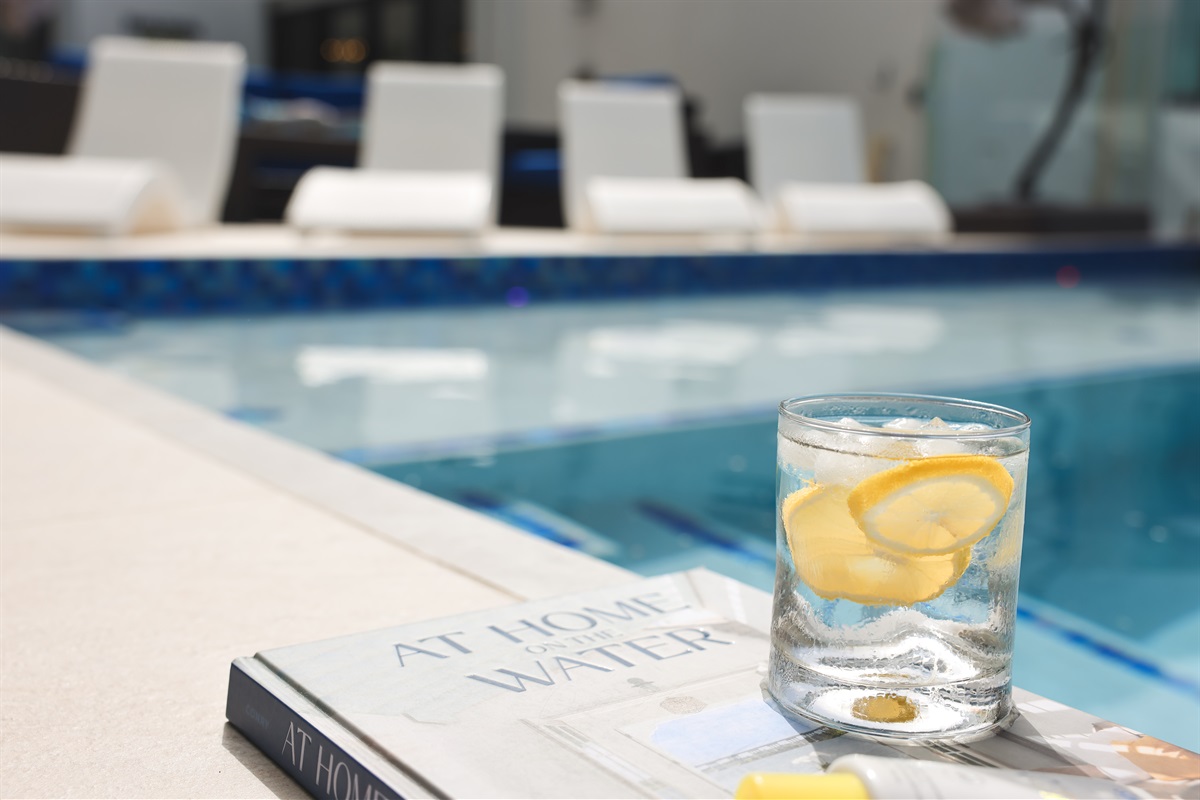 Poolside tranquility with chic, modern furnishings for ultimate comfort.