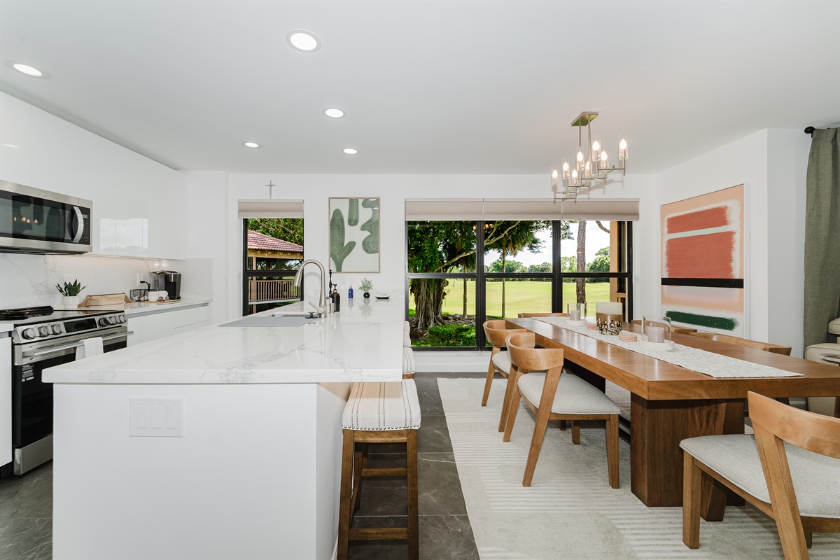 Open-concept dining area that connects seamlessly to the kitchen and living room. Ideal setup for gathering, dining, and creating lasting memories.