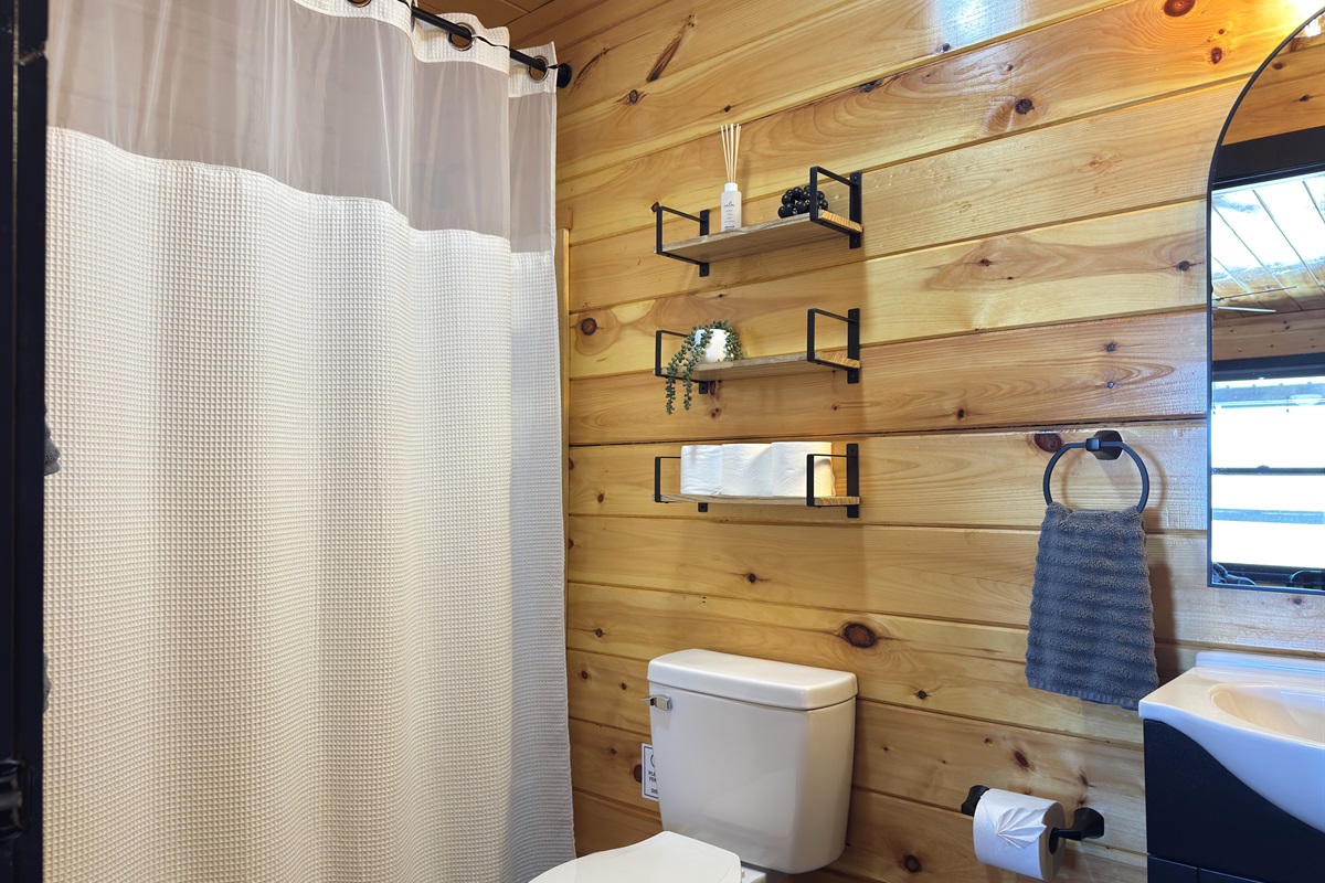 Bathroom attached to first floor king bedroom