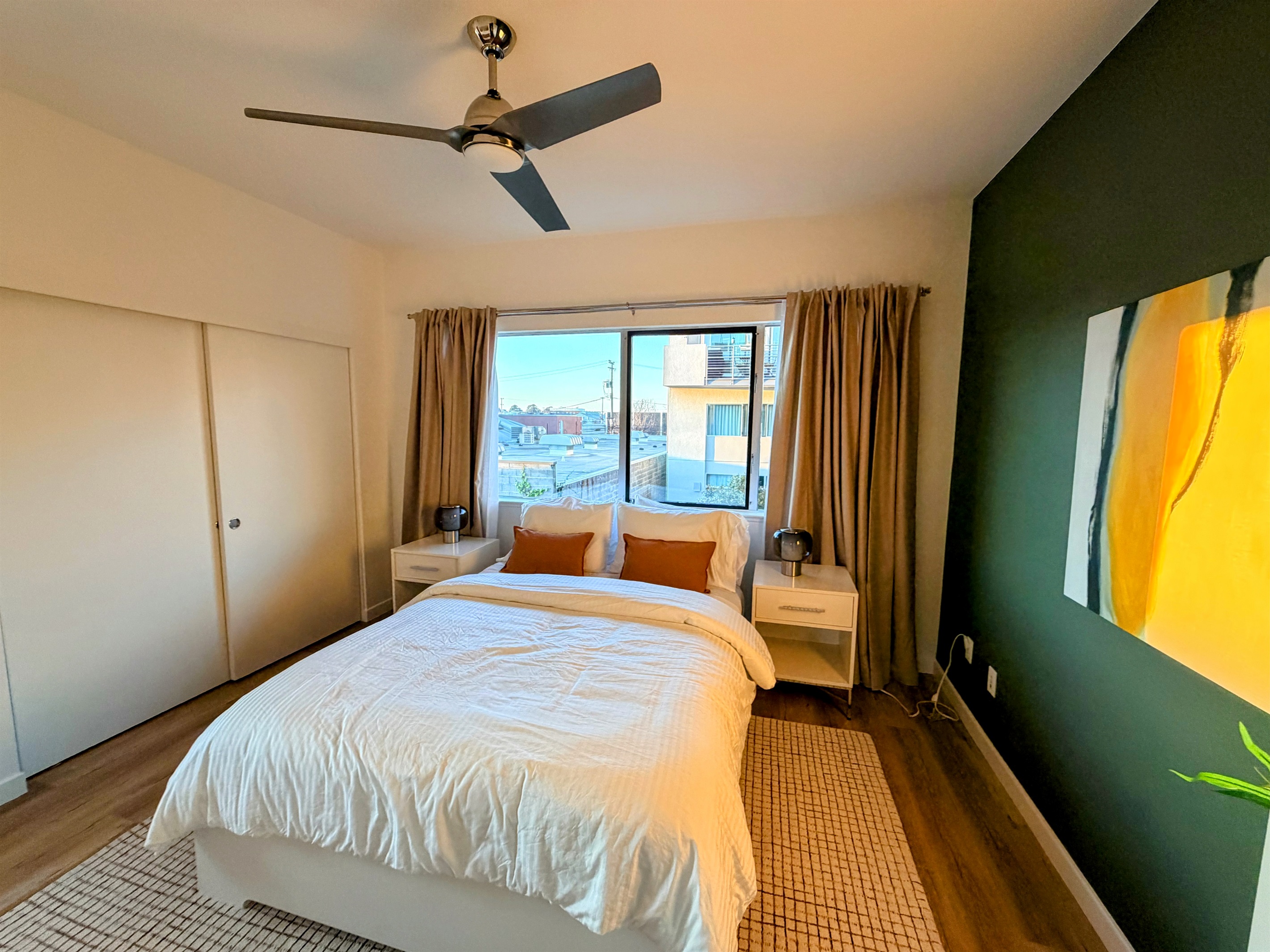 Primary bedroom with queen bed.