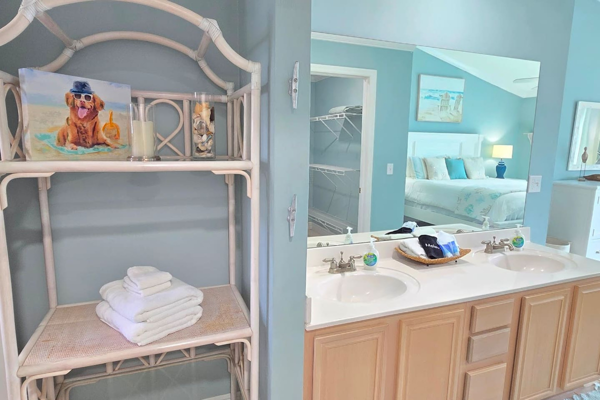 Extra shelving in the master bath keeps toiletries organized so counter space stays yours all week &mdash; no digging through bags.