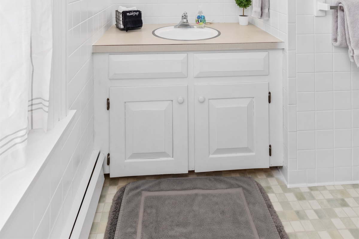 Shared Bathroom at top of landing including standard tub