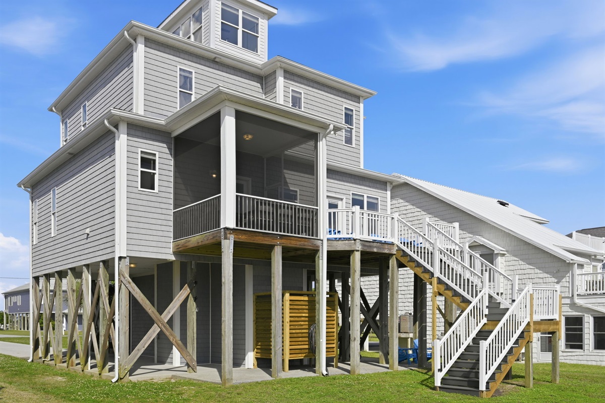 Relax on the back decks and screened porch while enjoying peaceful waterfront views