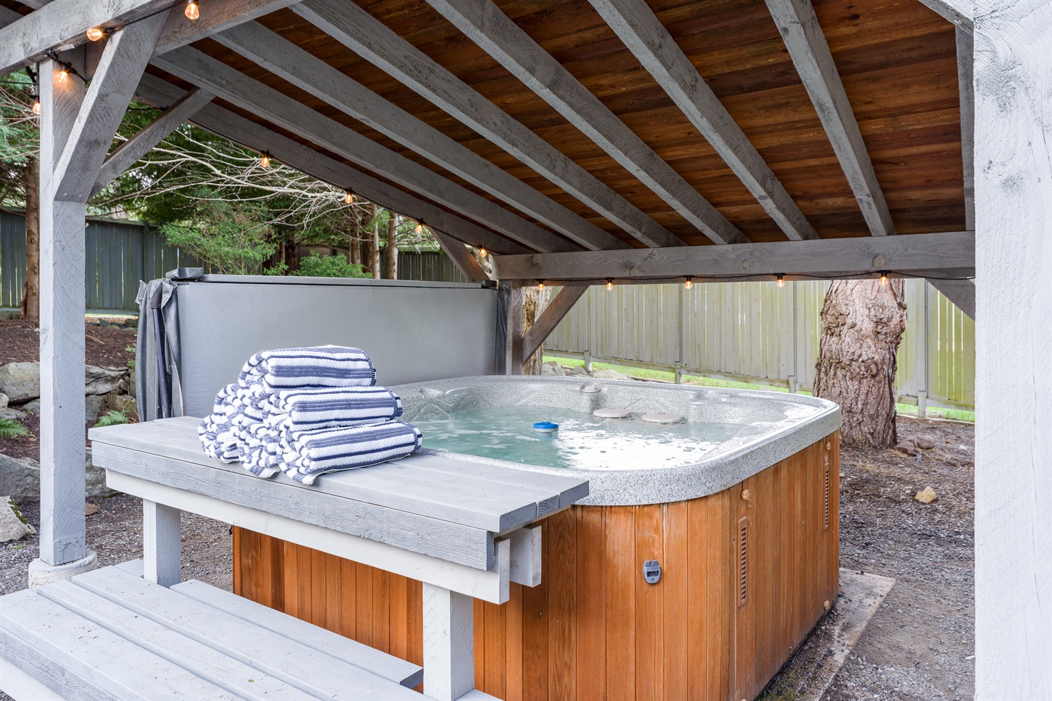 Day or night, this hot tub is perfectly positioned to enjoy a soak that will ease your worries away.