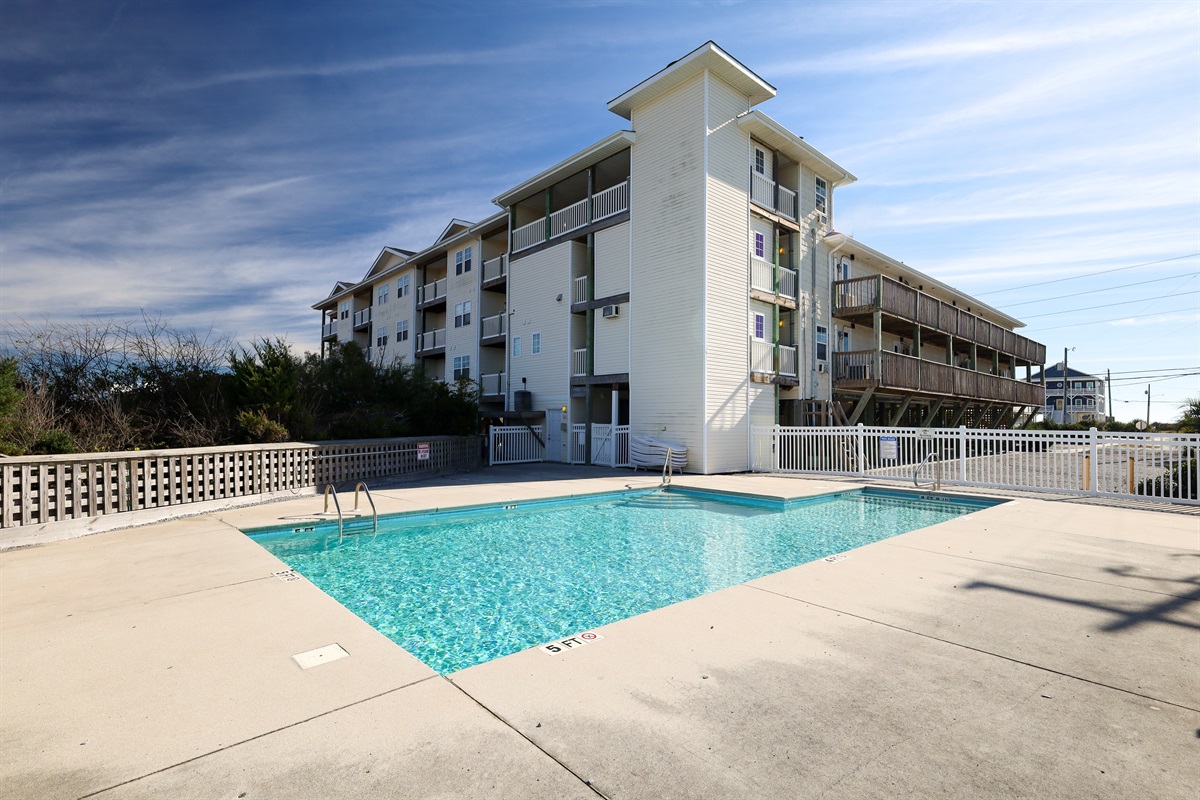 Outdoor pool with view of Tiffany's building
