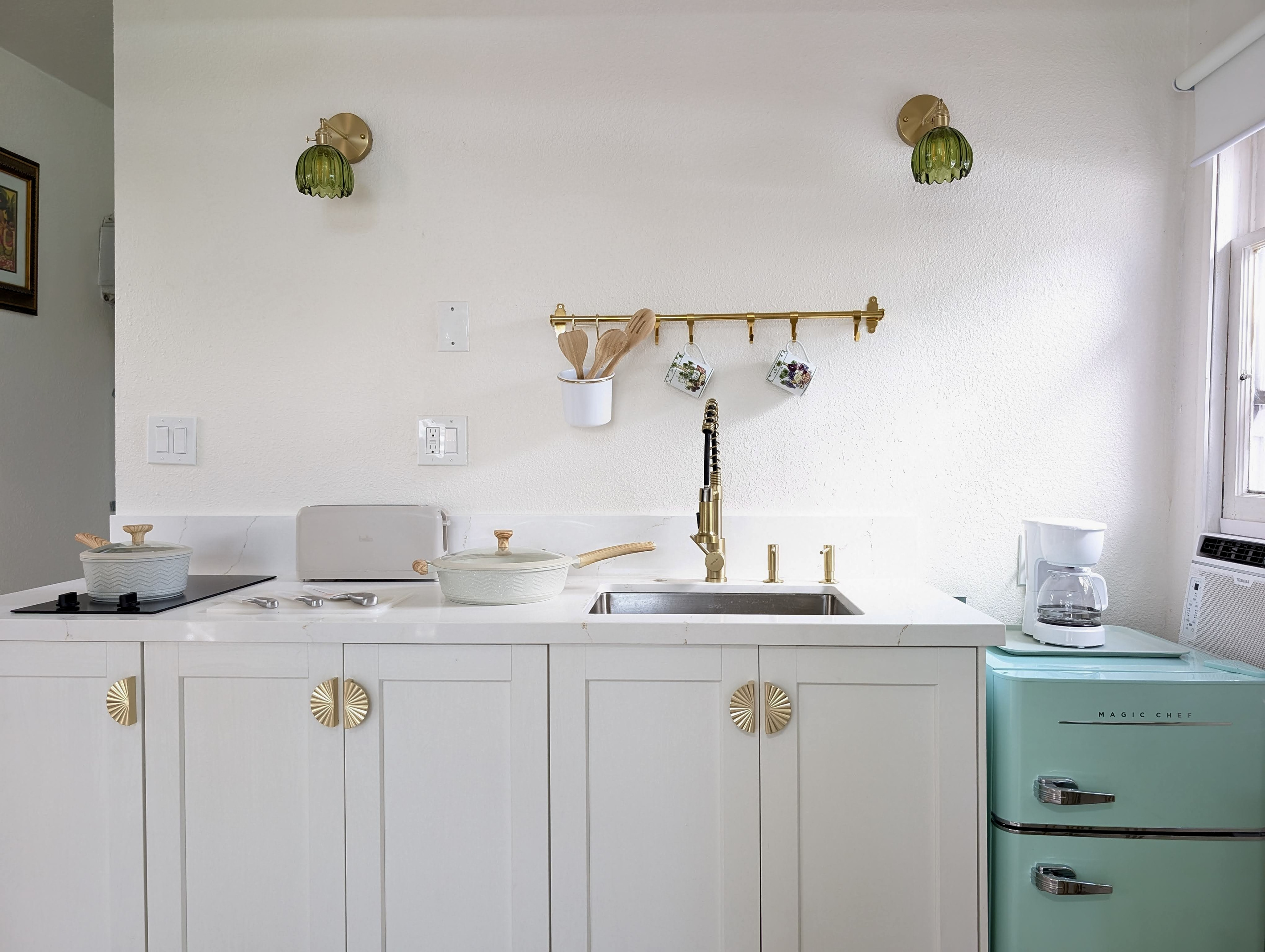 Thoughtfully designed kitchenette with modern conveniences.