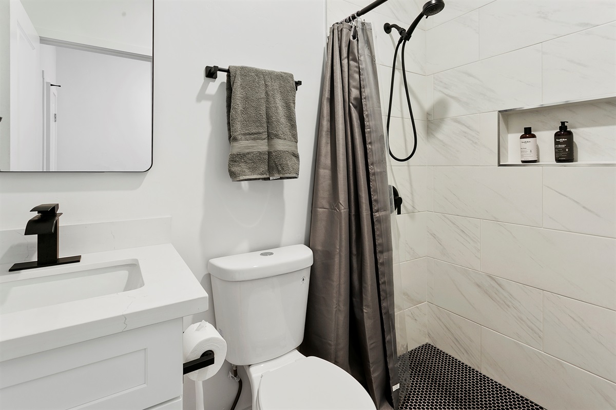 Totally new bathroom - gorgeous tiled shower with nook and bathroom amenities