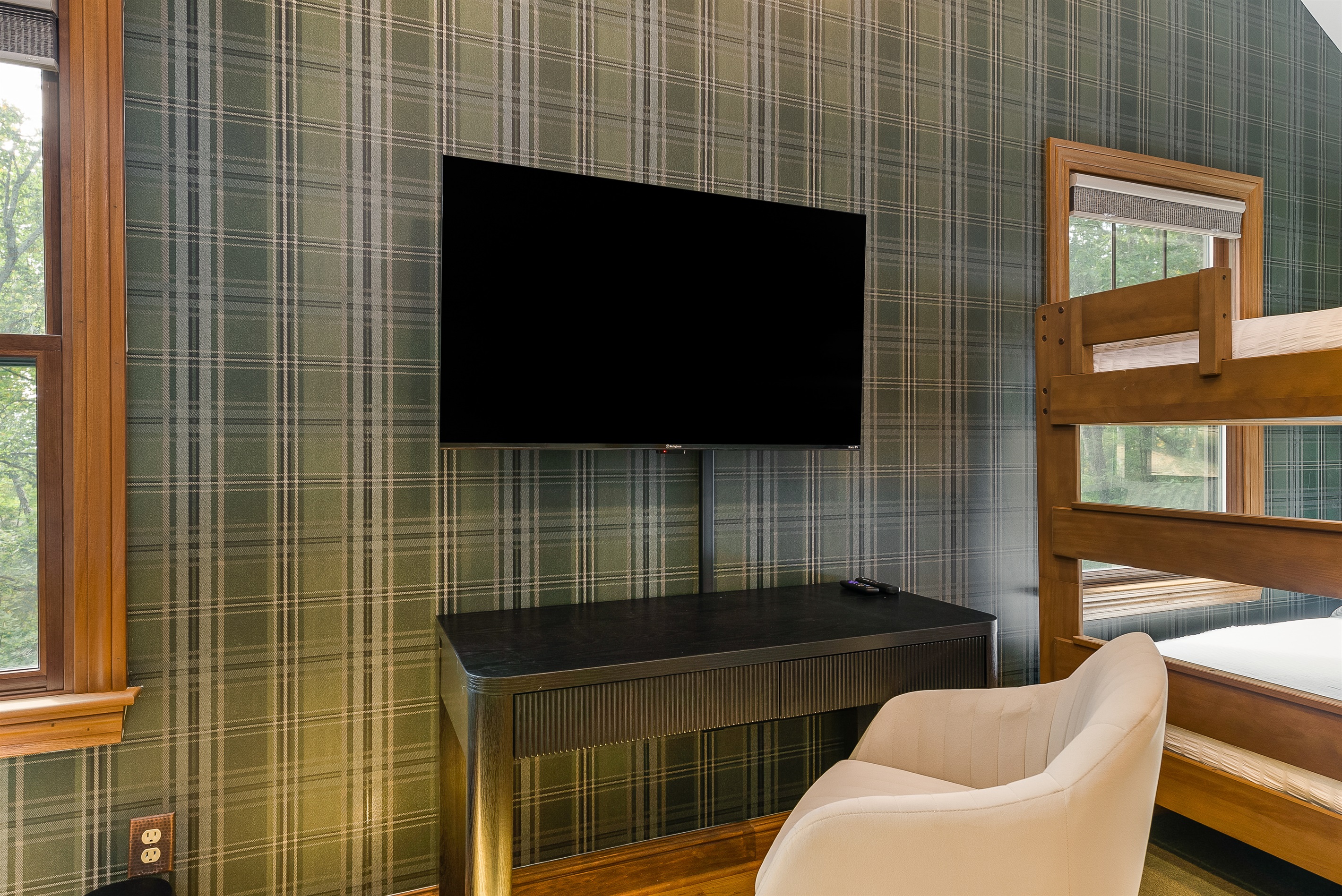 Work or study with ease, desk + chair in the double queen room.