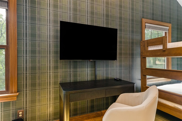 Work or study with ease, desk + chair in the double queen room.