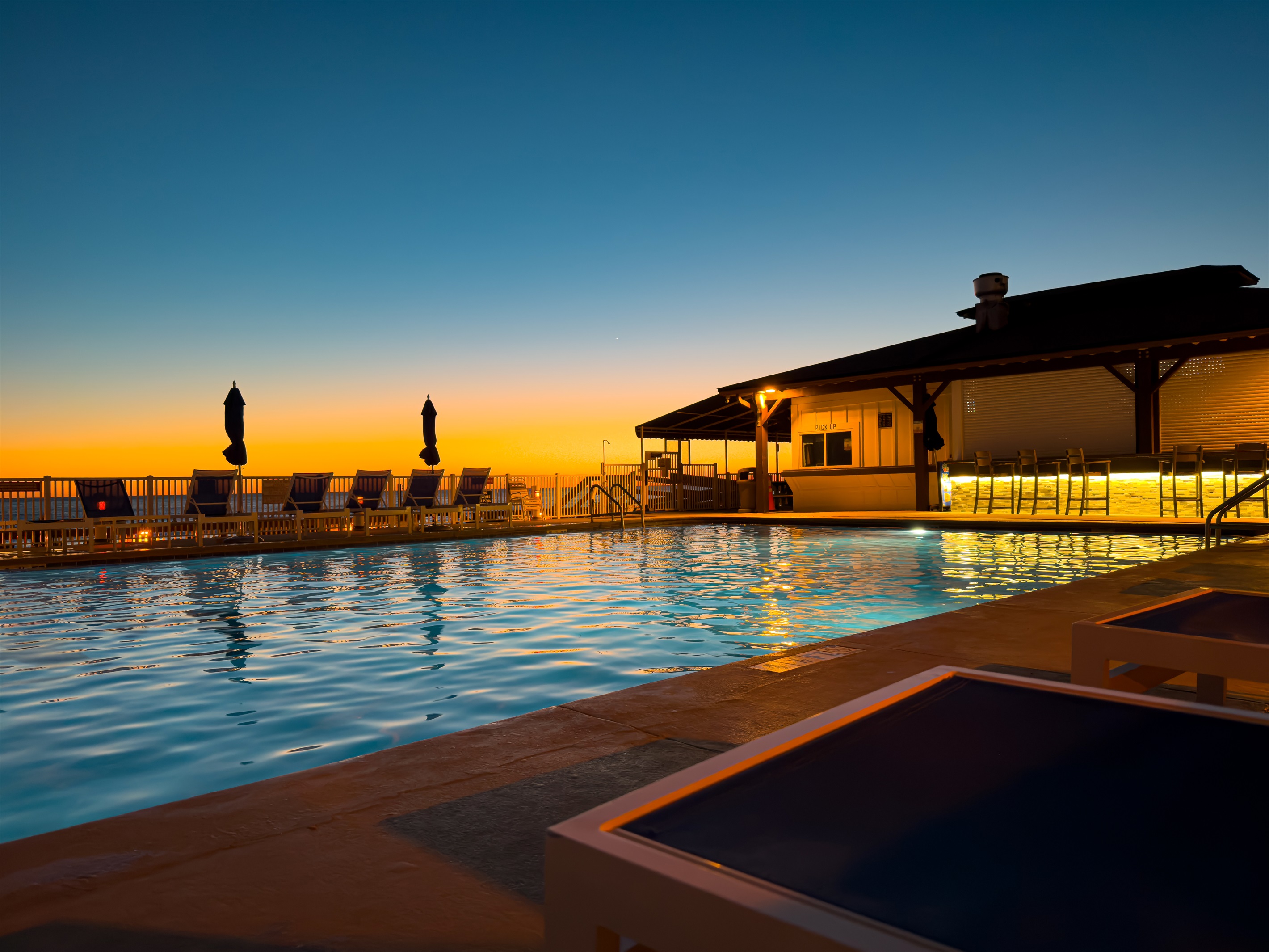 Watch the sky change colors over the water right from the edge of the pool.