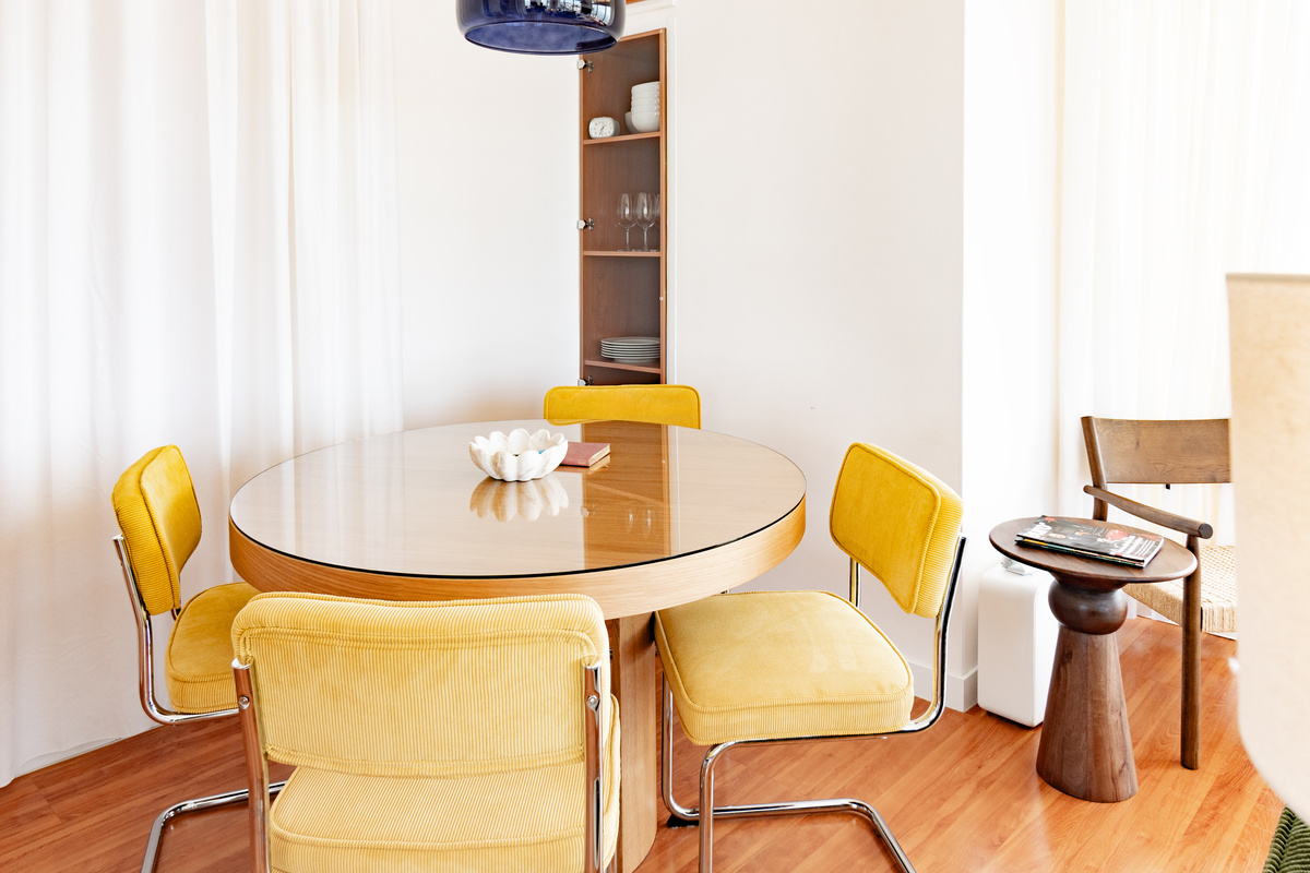 Dining area beside the living room and open kitchen