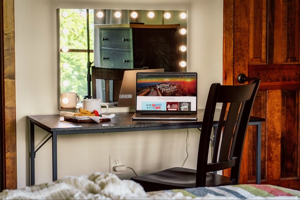 Cozy workspace with bright vanity lighting—perfect for work or getting ready.