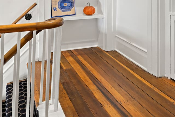 Original handrail and hardwood floors. So much character in this place!