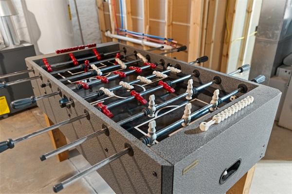 Foosball Table in unfinished basement
