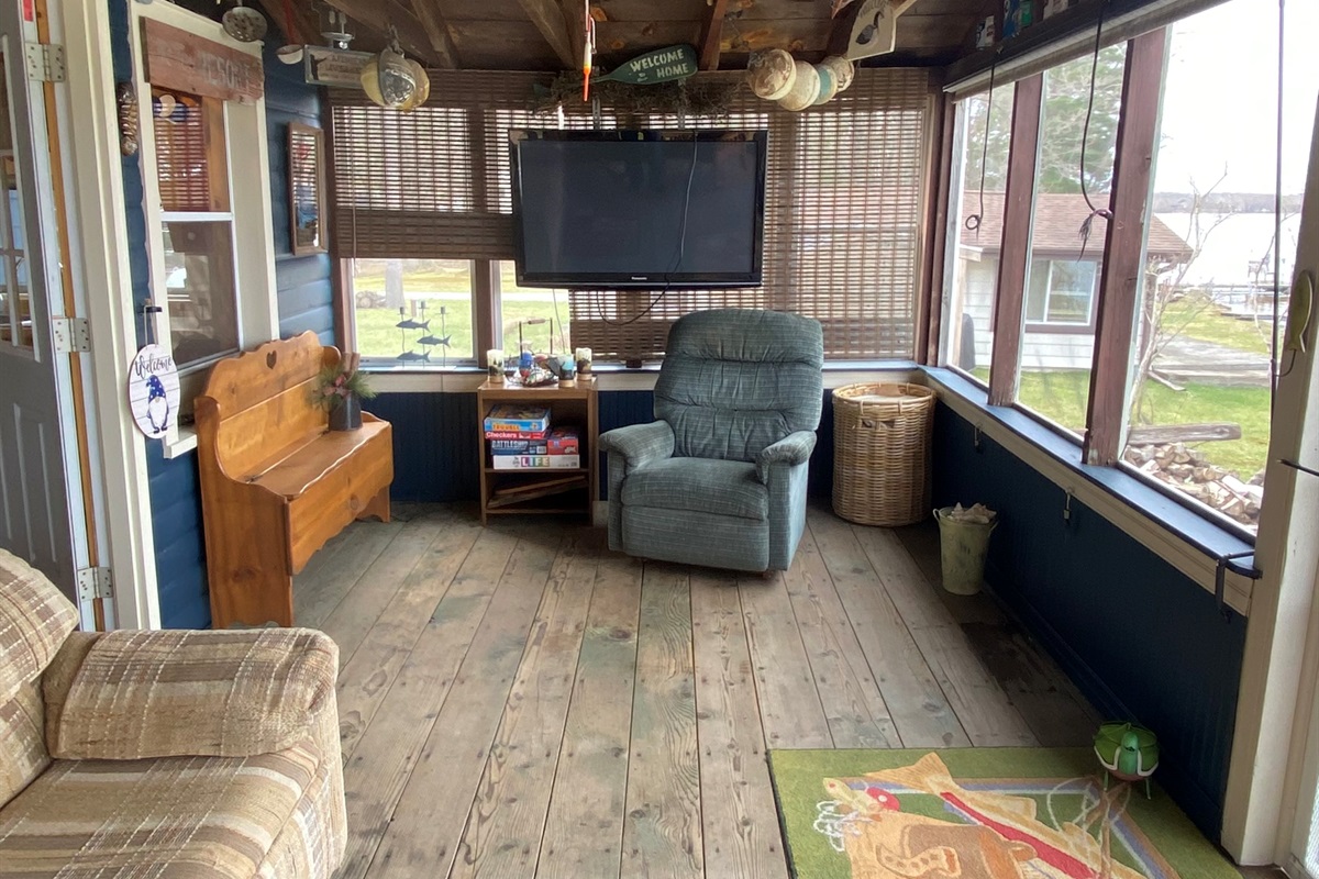 Relaxing screened in porch to relax and watch T.V.