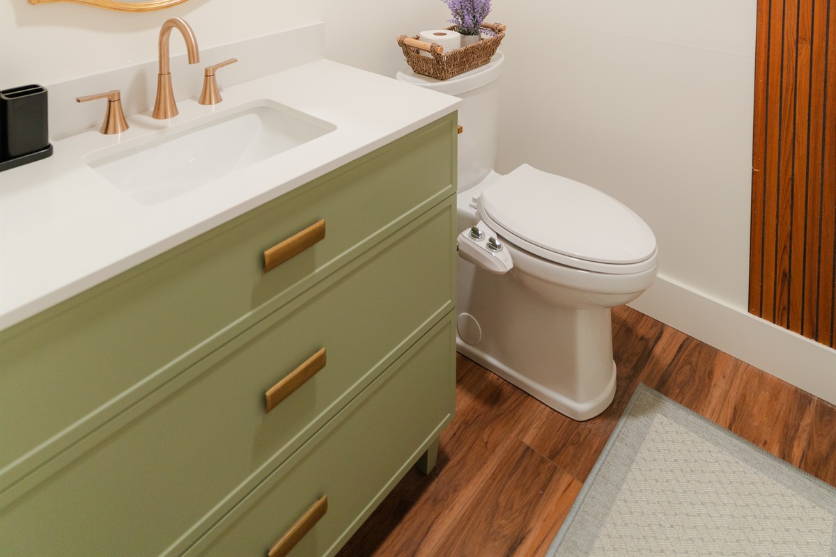 This bathroom offers a simple, fresh setup for everyday comfort.