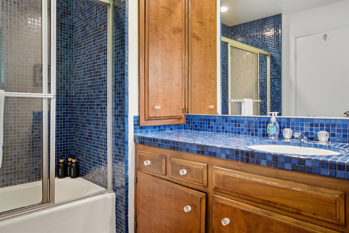 This bathroom is attached to the room with two queen beds