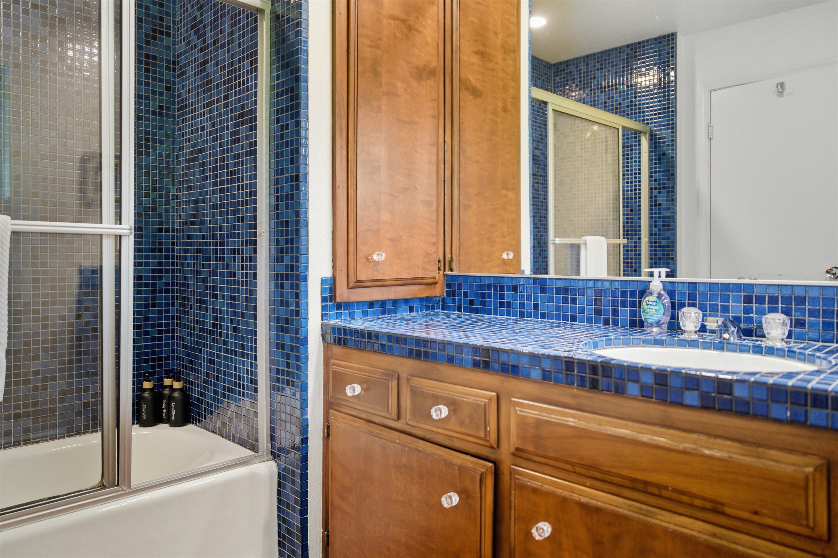 This bathroom is attached to the room with two queen beds