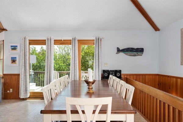 Seating for 10 at the dining room table plus 3 bar seats